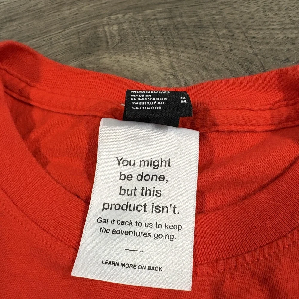 The North Face Shirt Mens Medium Orange Long Sleeve Graphic Circular Design